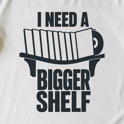 I Need a Bigger Shelf Tee - White close-up print