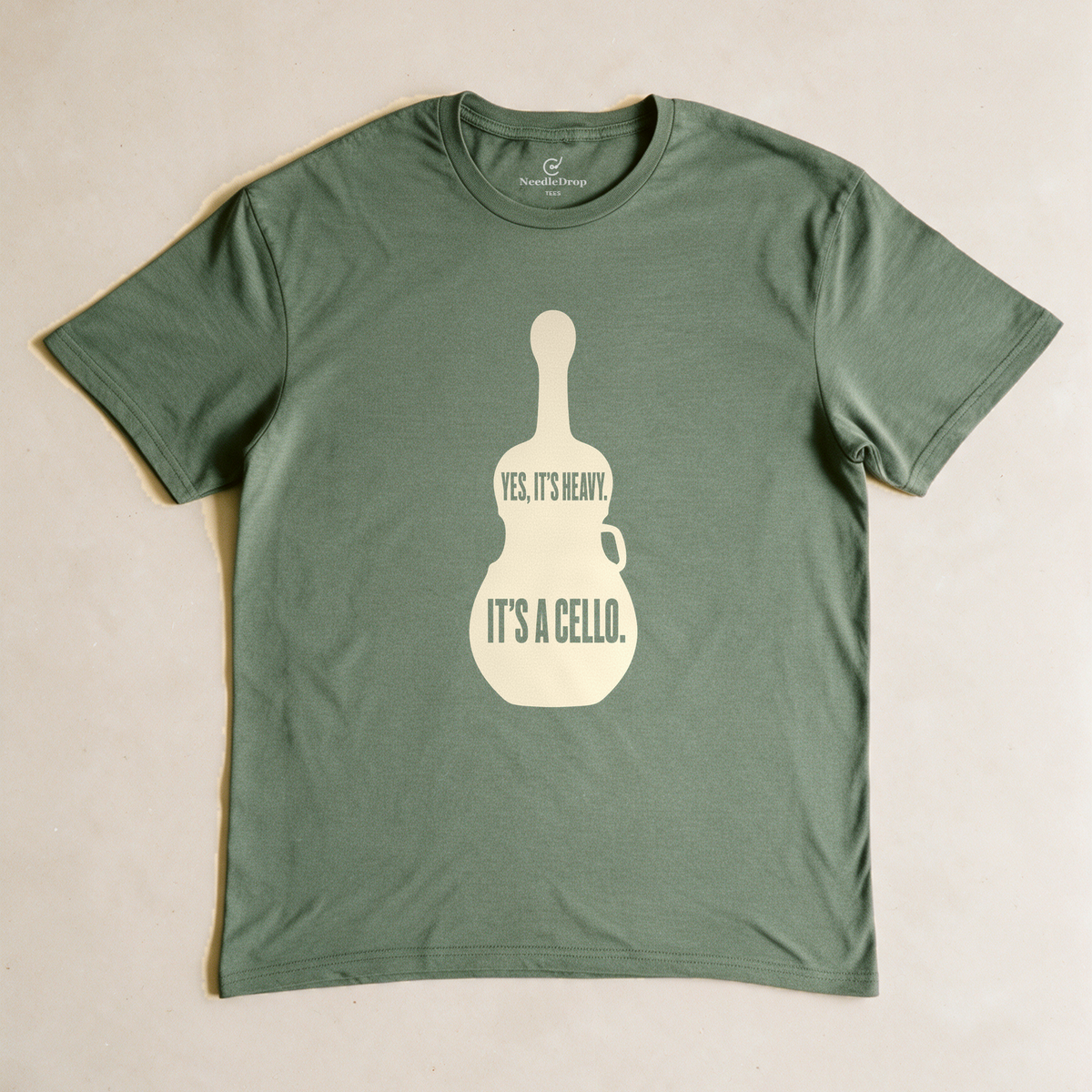 Yes, It's Heavy. It's a Cello. Tee - Military Green flatlay