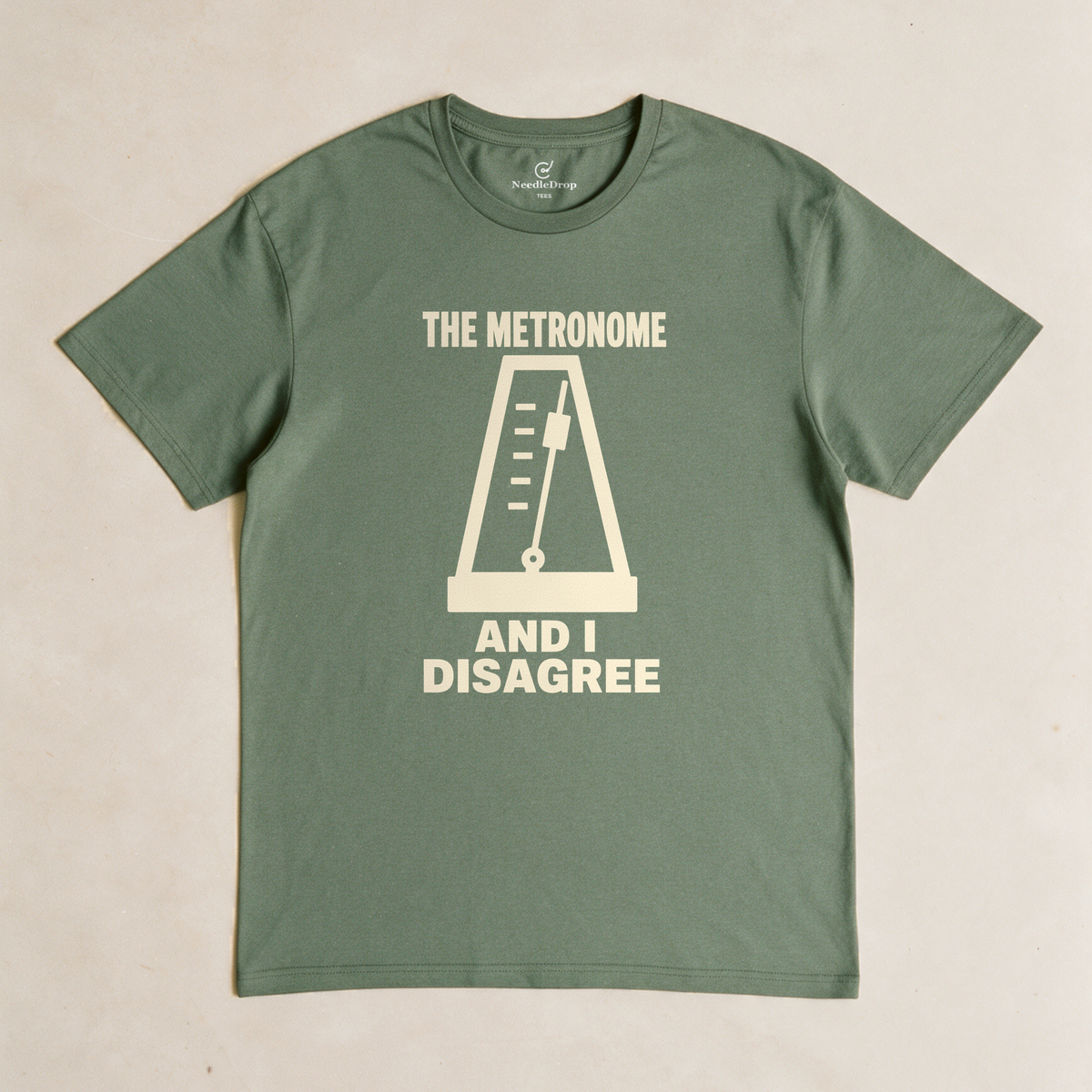 The Metronome and I Disagree Tee - Military Green flatlay