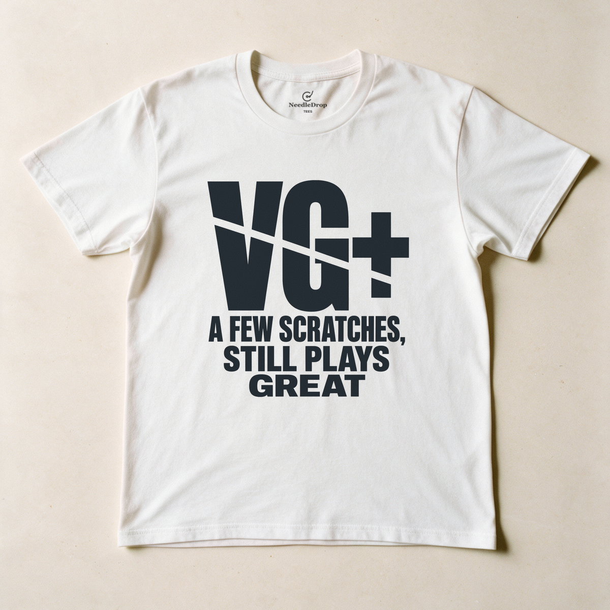 VG+ Still Plays Great Tee - White flatlay